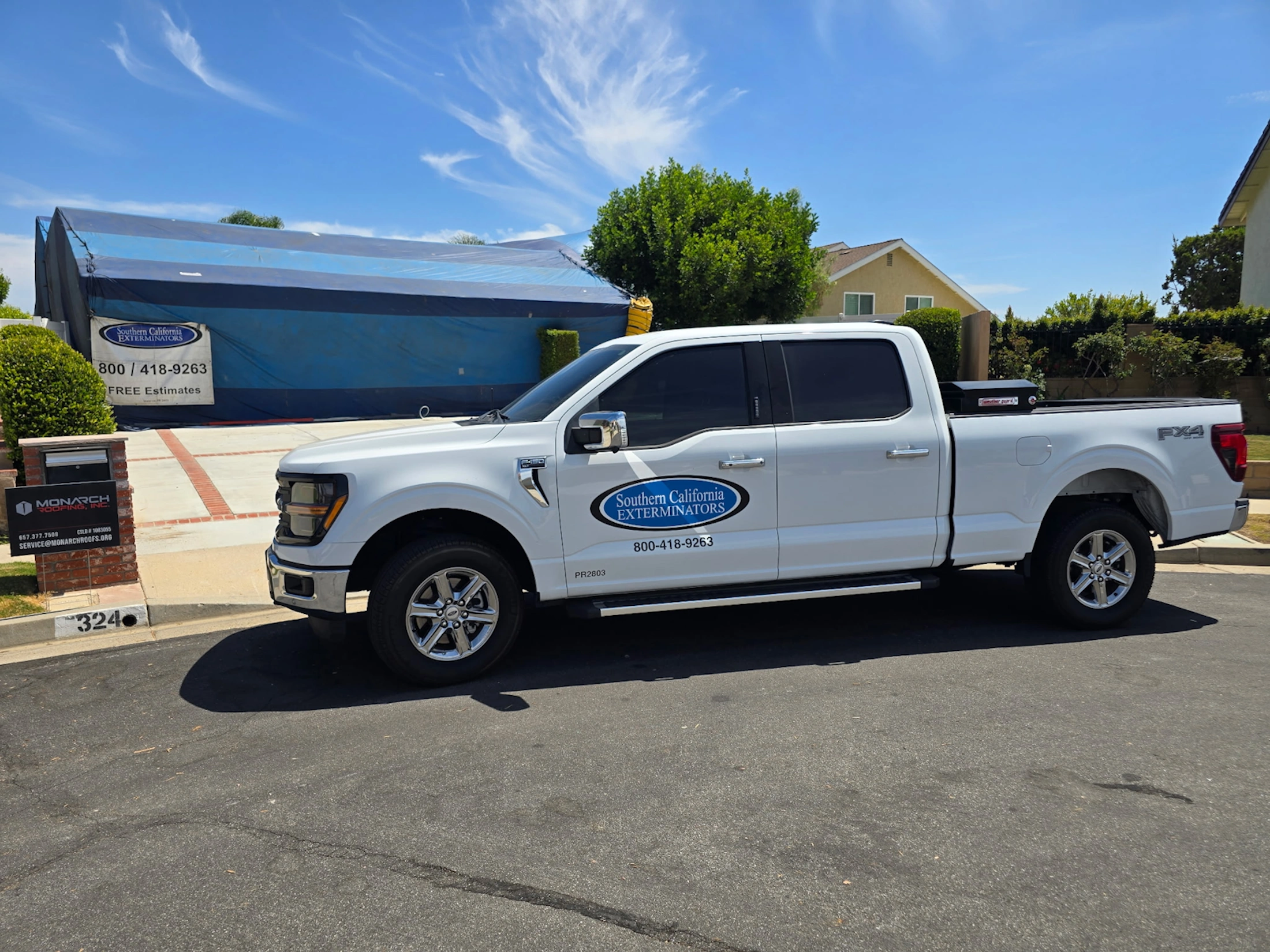SoCal Pest blue truck in Orange County neighborhood 714-236-1200
